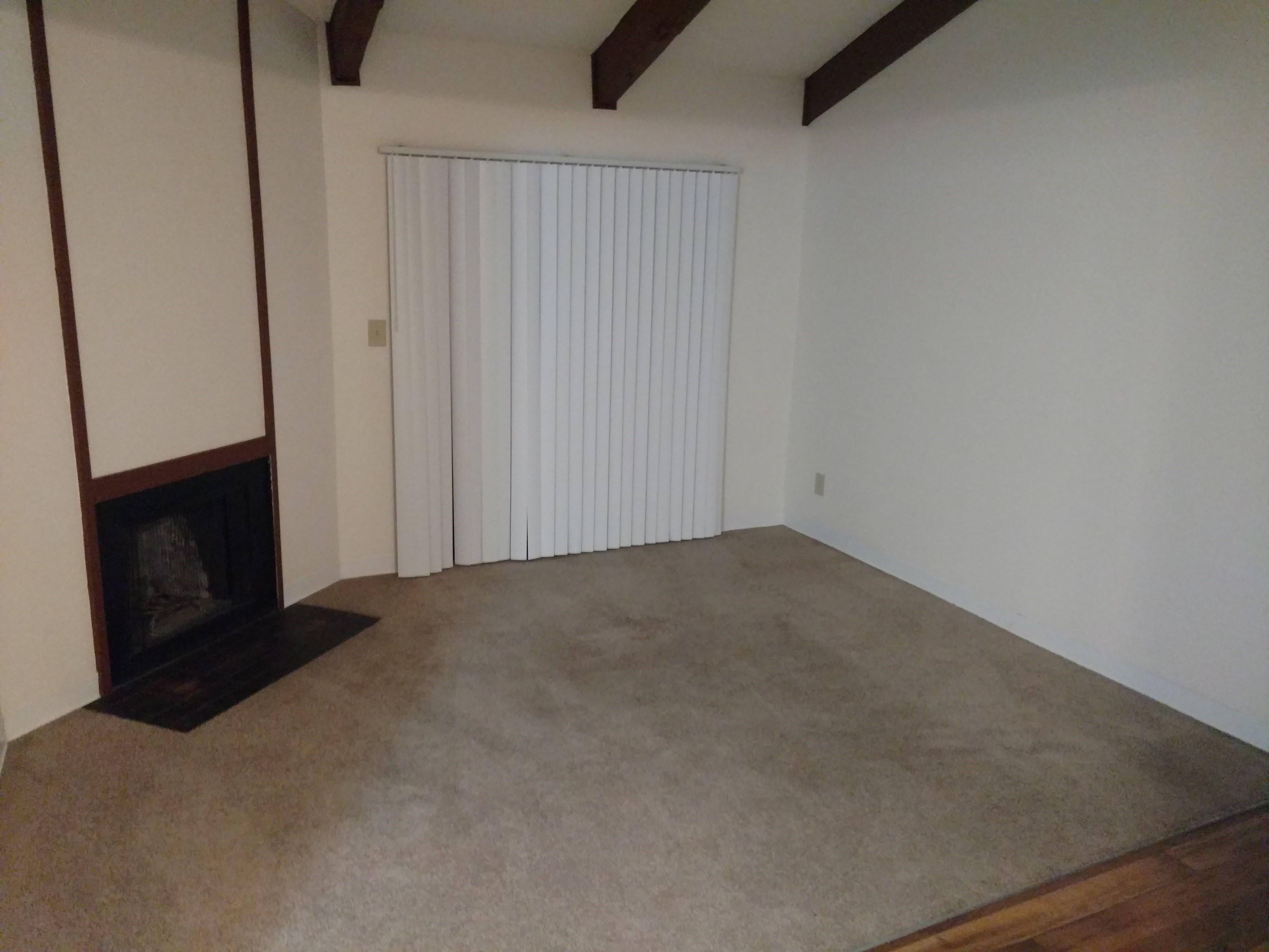 Spacious Living Room With Separate Shelf